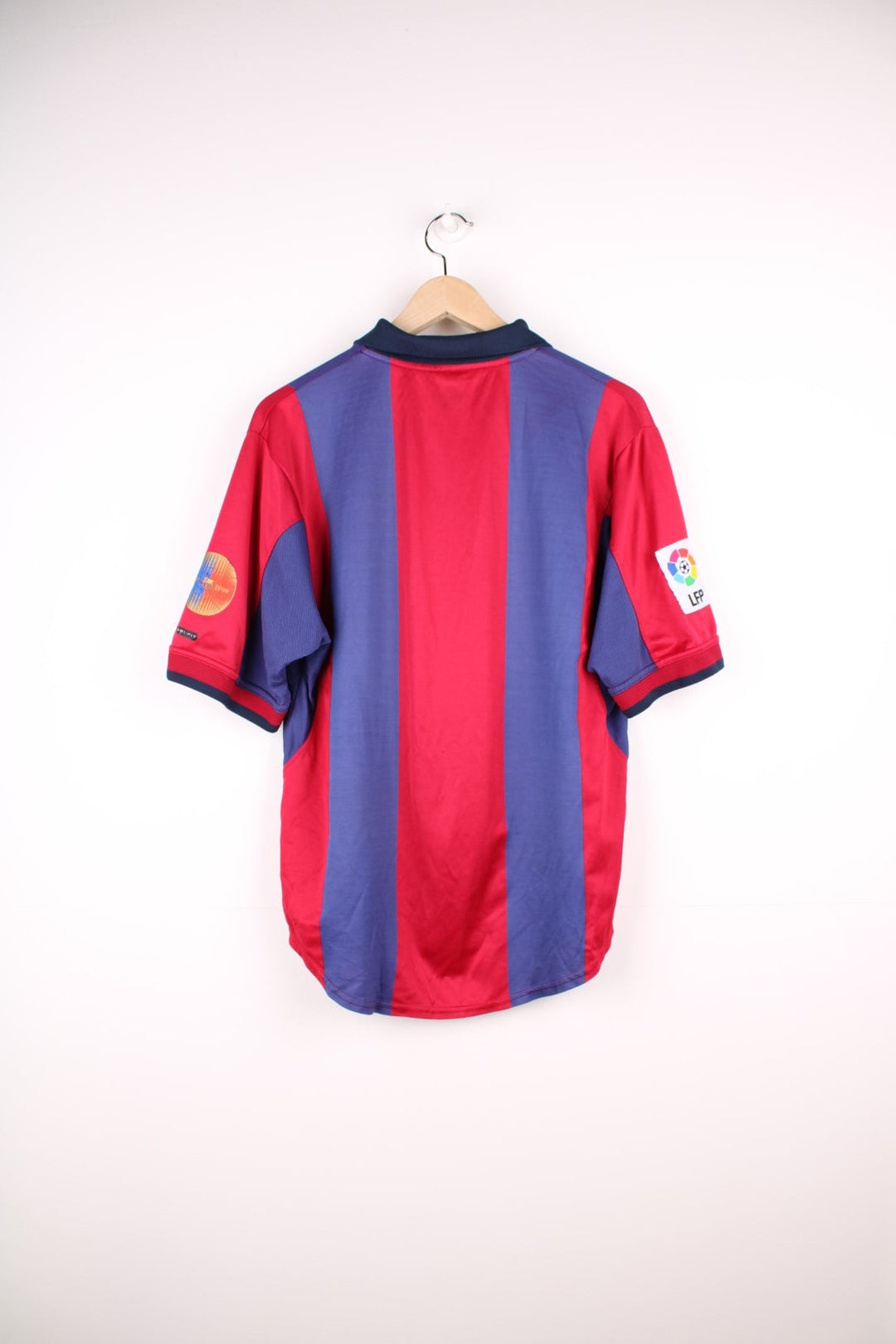 Barcelona 1998/99  Football Shirt in the  and blue home colourway, features embroidered logo and badge on the front.