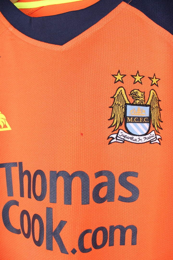 Manchester City 2008/09  Football Shirt in the  third kit colourway, features embroidered logo and badge on the front, and is signed by Elano number 11 and Robinho number 10.