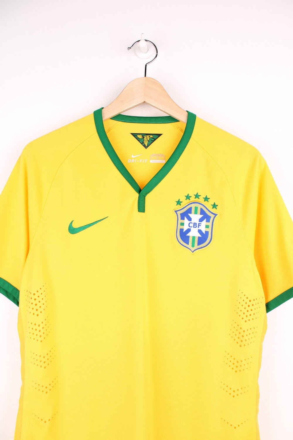 Brazil 2014/15  Football Shirt in the  home kit colourway, features embroidered logo and badge on the front.