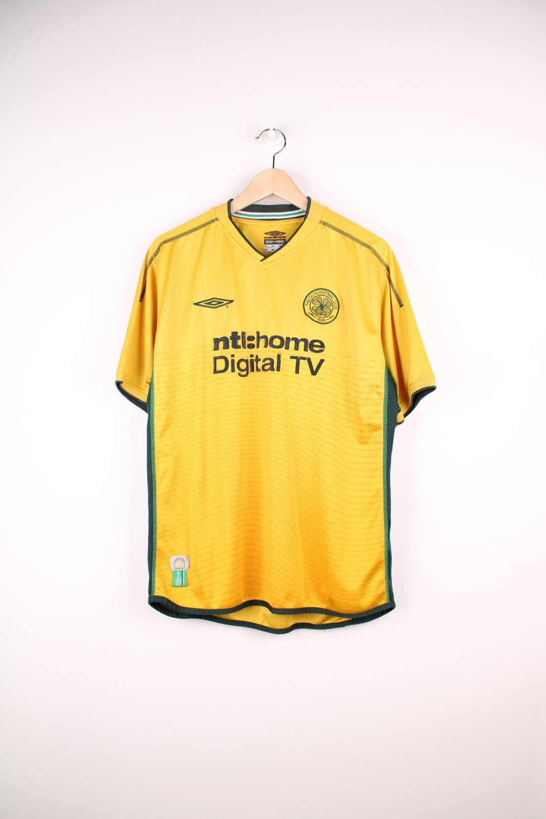 Celtic 2002/03 Umbro Football Shirt in the yellow away kit colourway, features embroidered logo and badge on the front.