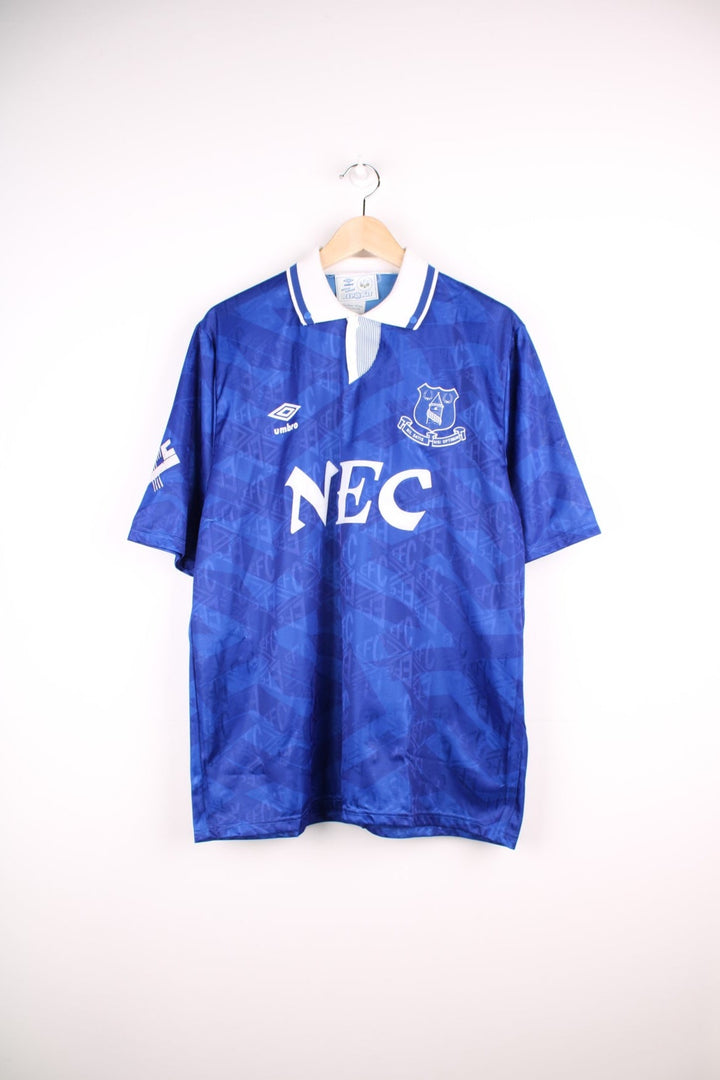 Everton 1991/93 Umbro Football Shirt in the blue home kit colourway, features embroidered logo and badge on the front.