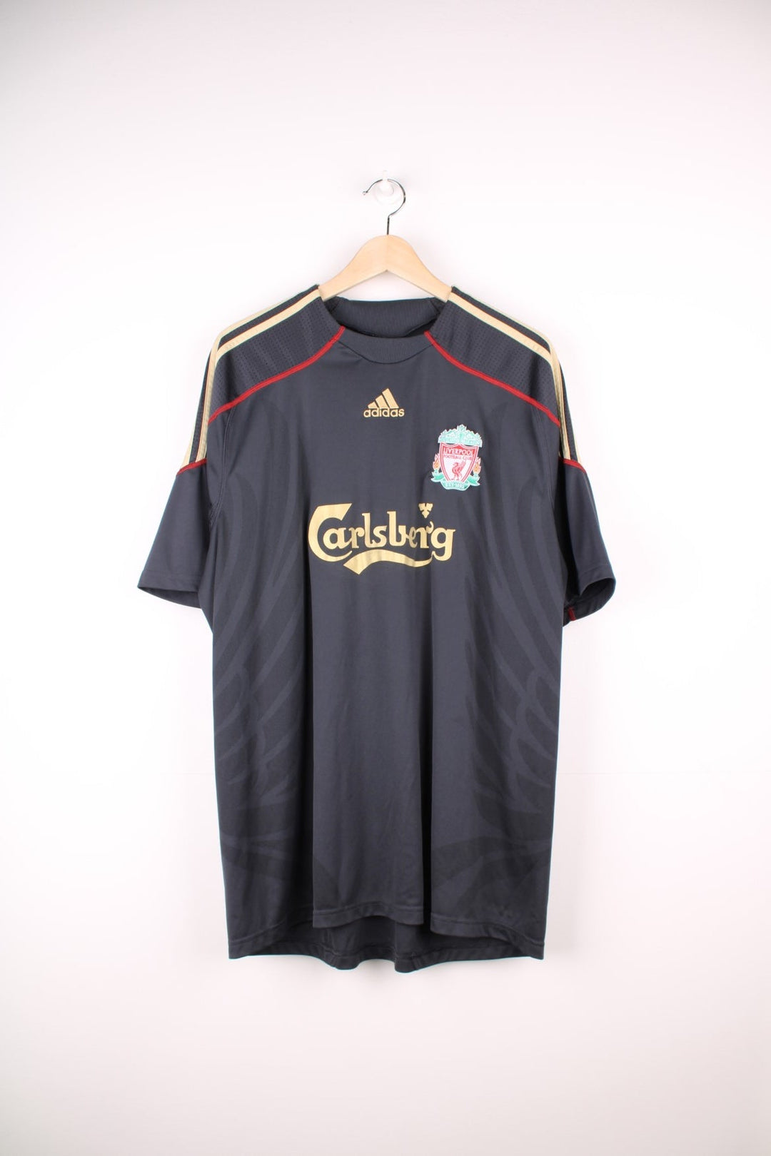 Liverpool 2009/10 Adidas Football Shirt in the grey away kit colourway, features embroidered logo and badge on the front.