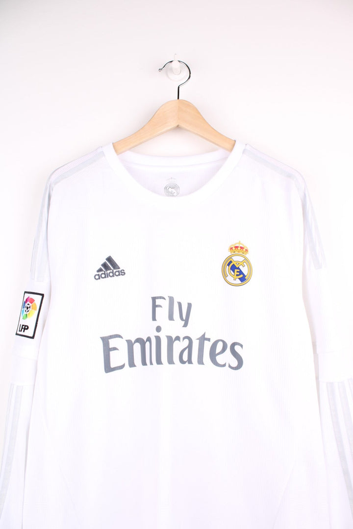 Real Madrid 2015/16  Longsleeve Football Shirt in the  home kit colourway, features embroidered logo and badge on the front.