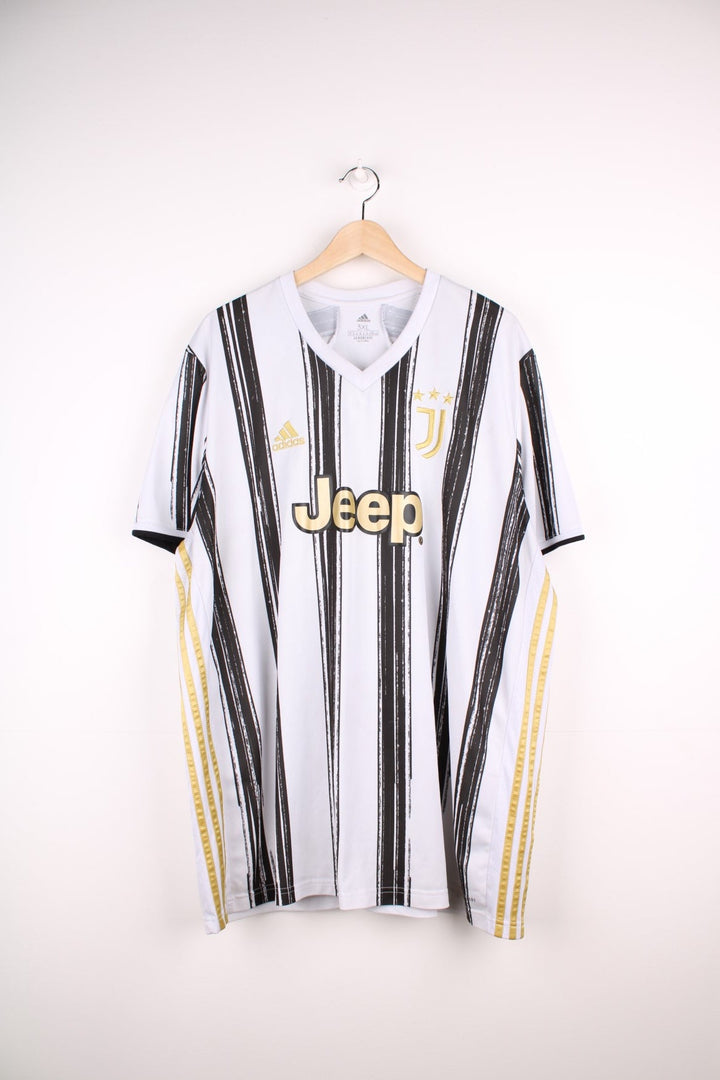 Juventus 2020/21 Adidas Football Shirt in the white and black home kit colourway, features embroidered logo and badge on the front.