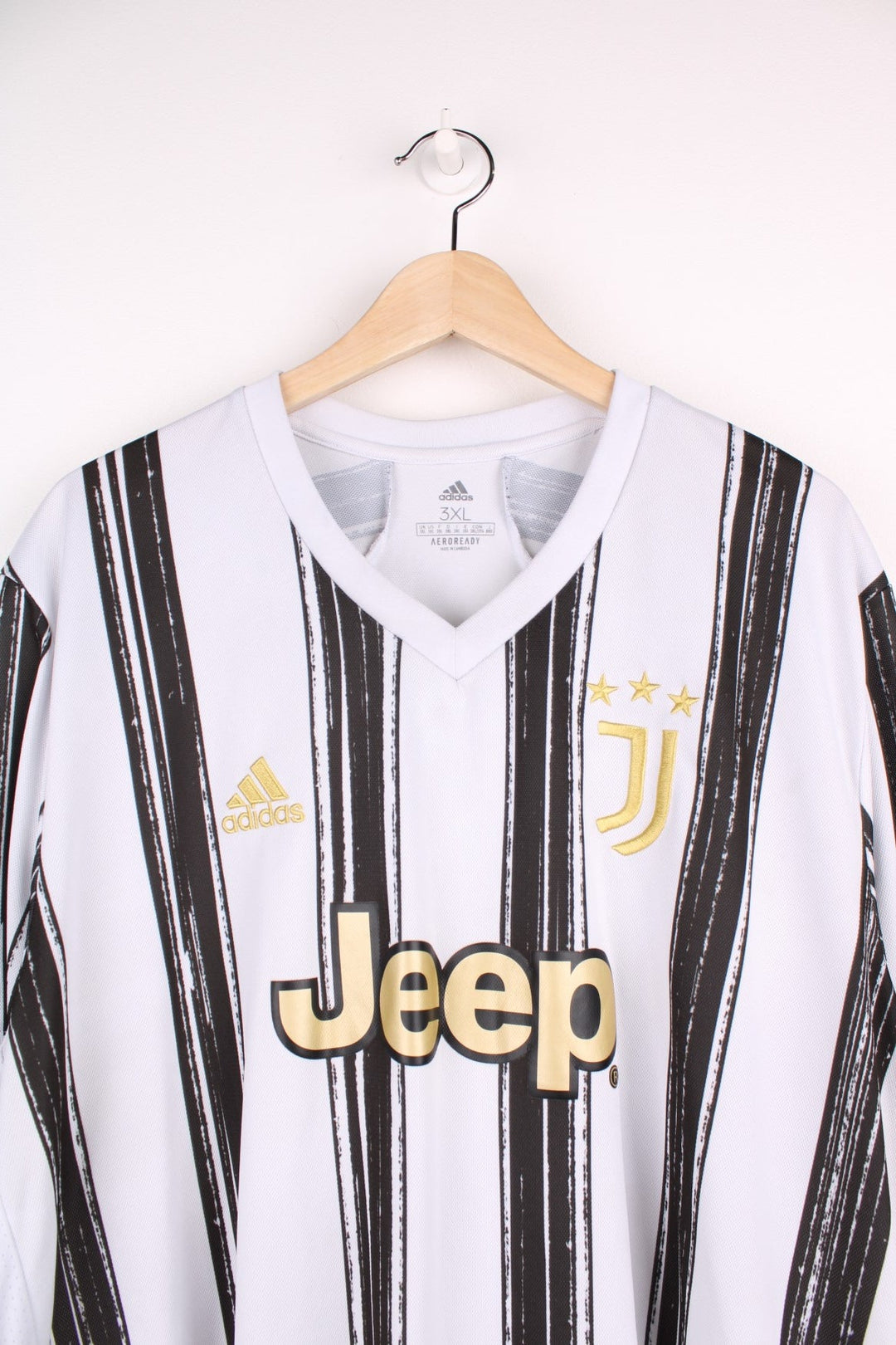 Juventus 2020/21  Football Shirt in the  and black home kit colourway, features embroidered logo and badge on the front.