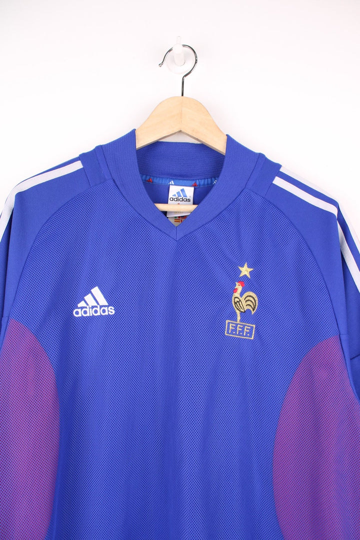 2002-2004 France Home Adidas Football Shirt in blue. Features embroidered logo and badge, and signature three stripes on each sleeve. 