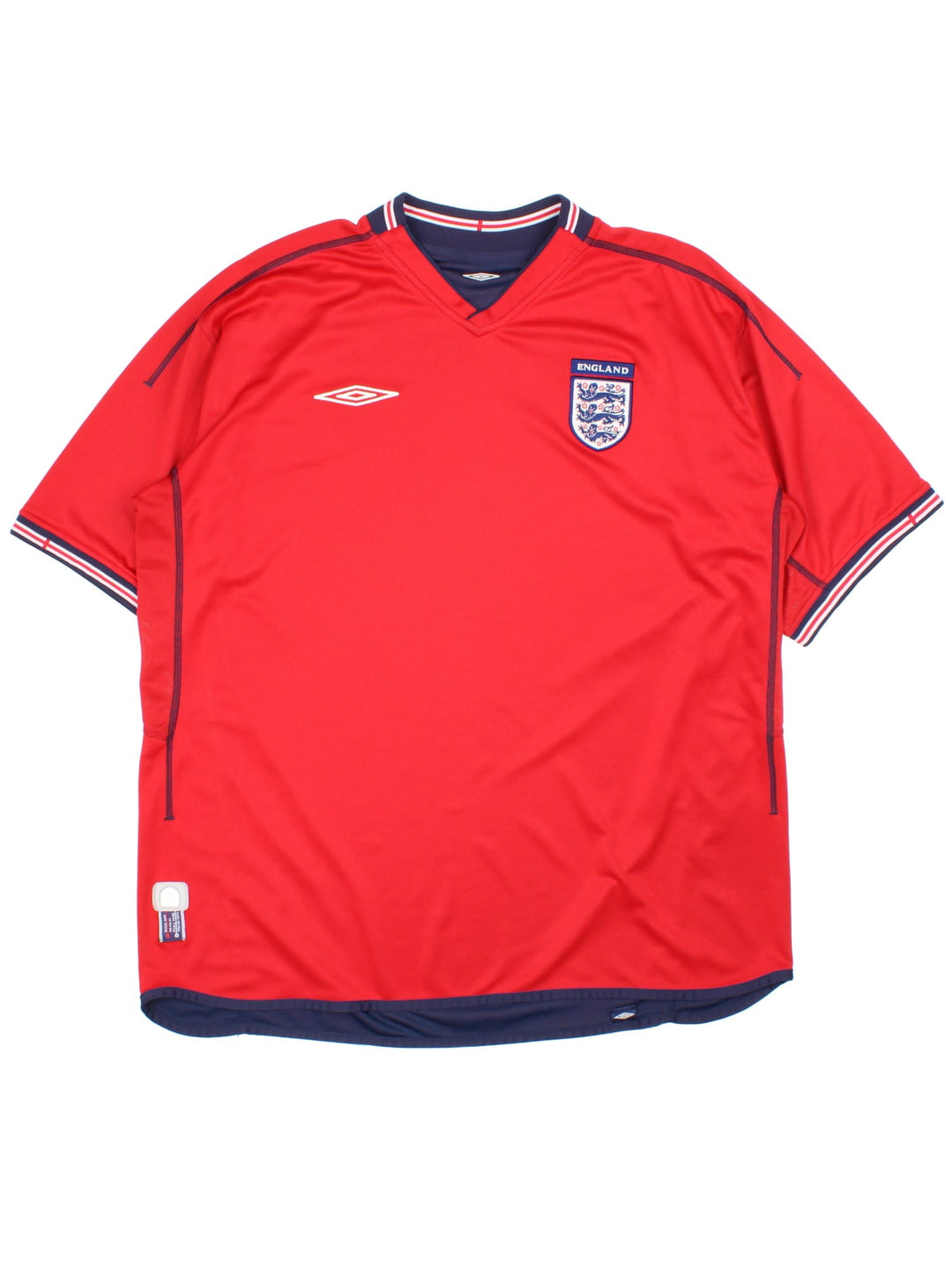 England 2002/04 Umbro Football Shirt in the red away kit colourway, features embroidered logos and badge on the front.