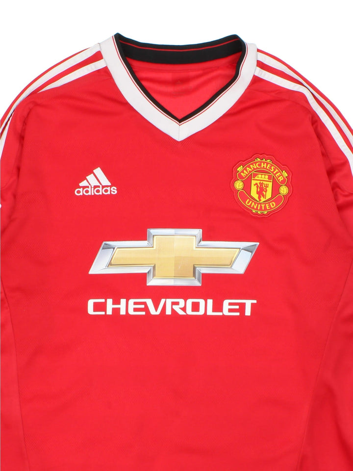 Manchester United 2015-16 Adidas Football Shirt in the red home kit colourway, features embroidered/printed logos and badge on the front.