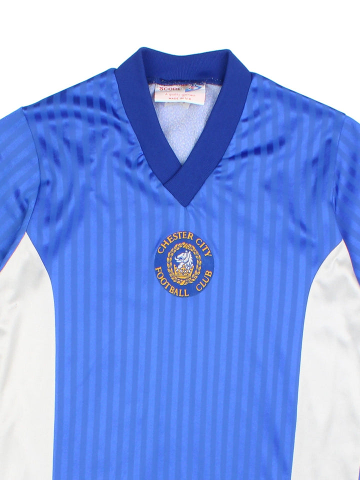 Chester City 1988-89 Vintage Football Shirt in the blue home kit colourway, features printed logos and badge on the front.