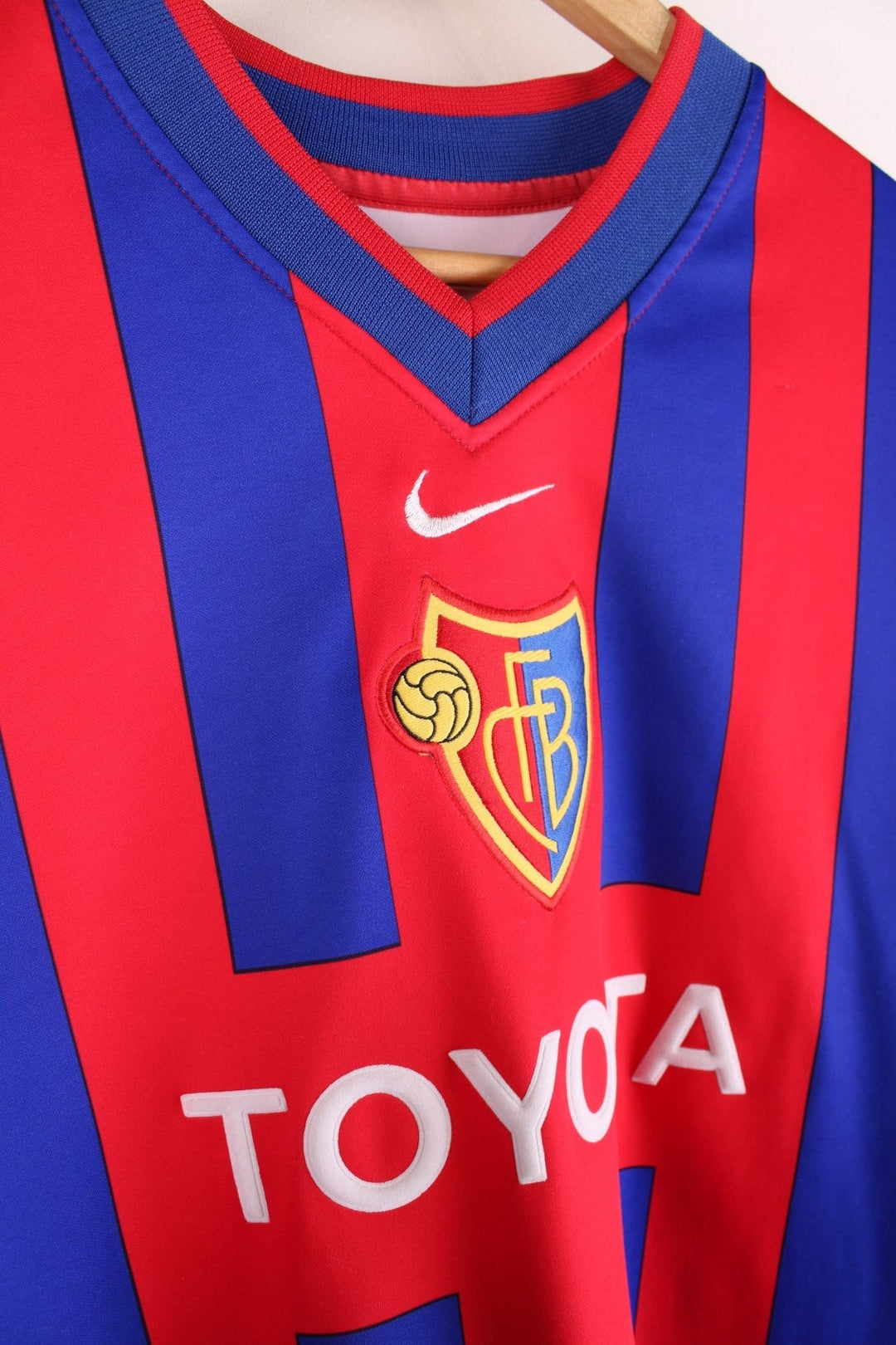 FC Basel 2001/02  Football Shirt in the  and blue home kit colourway, features embroidered logos and badge on the front.