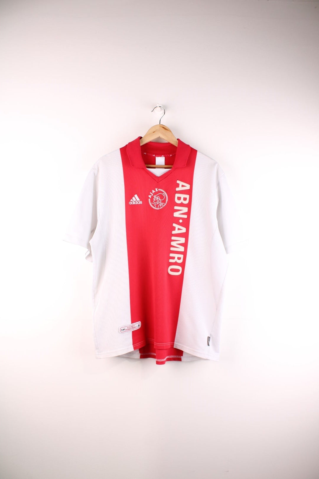 Ajax 2001/02 Adidas Football Shirt in the red and white home kit colourway, features embroidered logos and badge on the front.