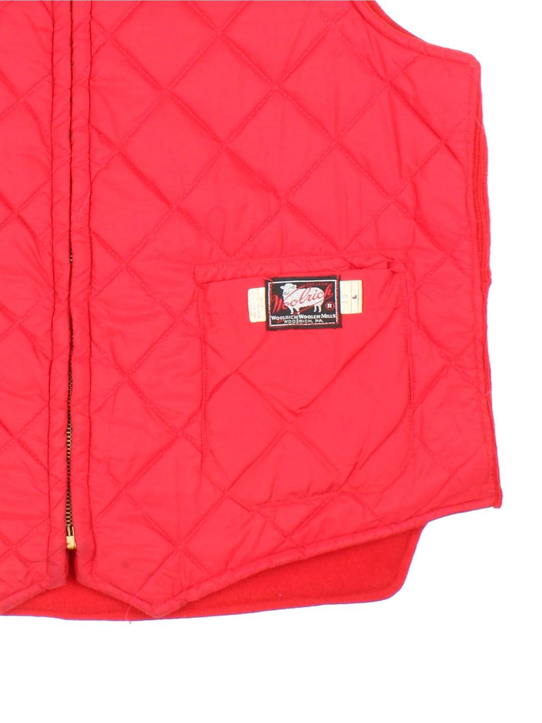 Vintage Woolrich Reversible Gilet in a red colourway with either wool or quilted shell options. Zips up and has multiple pockets, and the logo tab embroidered on the front of the quilted side.