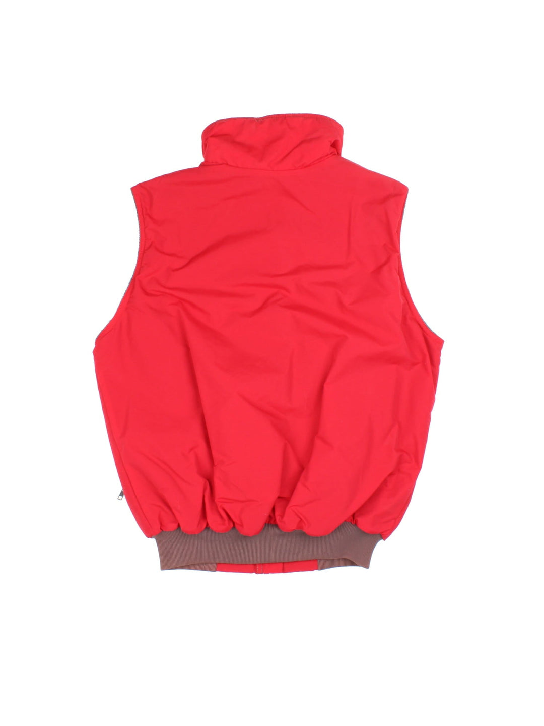 Vintage Patagonia Gilet in a red colourway. Zips up and has side pockets, insulated with a fleece lining, and has the logo embroidered on the front.