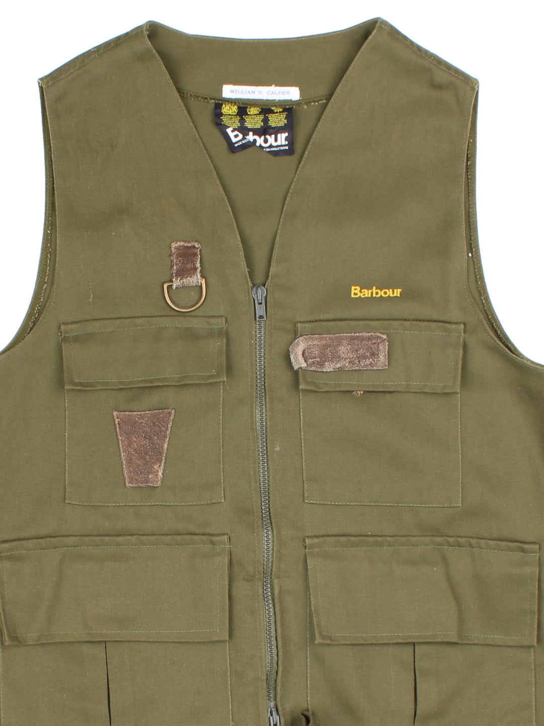 Vintage Barbour Fishing Utility Vest in a green colourway. Zips up and has multiple pockets, and the logo embroidered on the front.