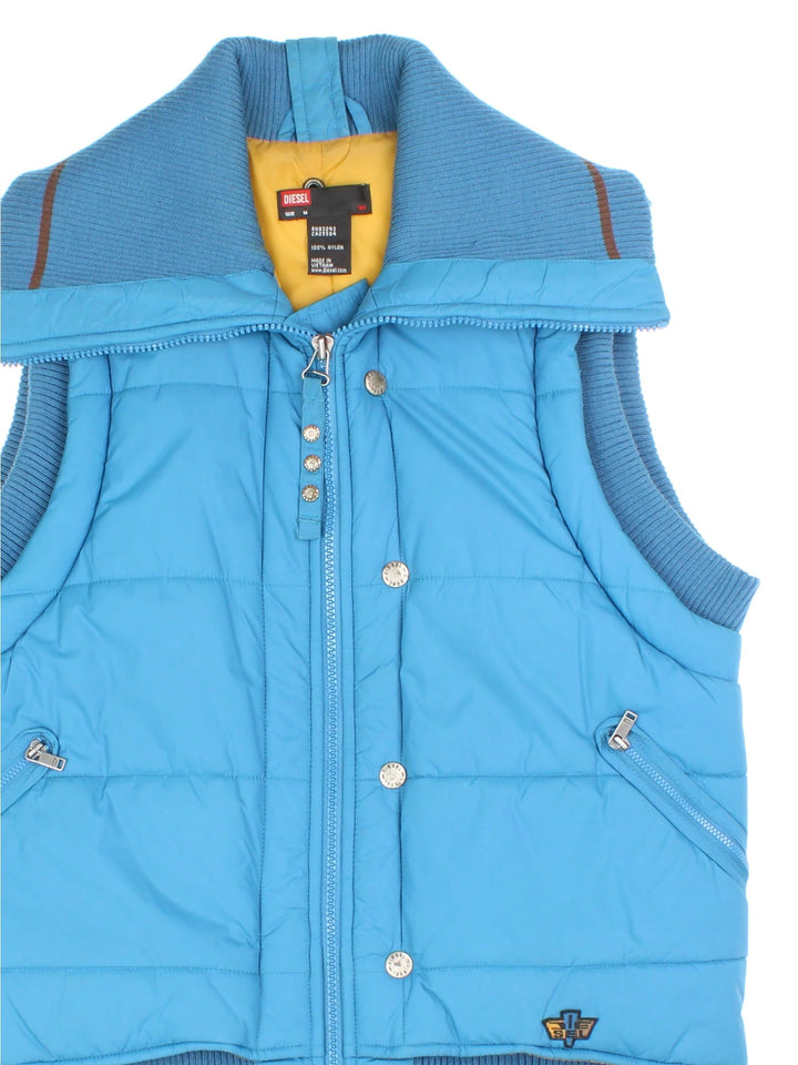 Vintage Y2K Diesel Gilet in a blue colourway. Zips up and has side pockets, insulated lining, big collar, and has the logo embroidered on the front.