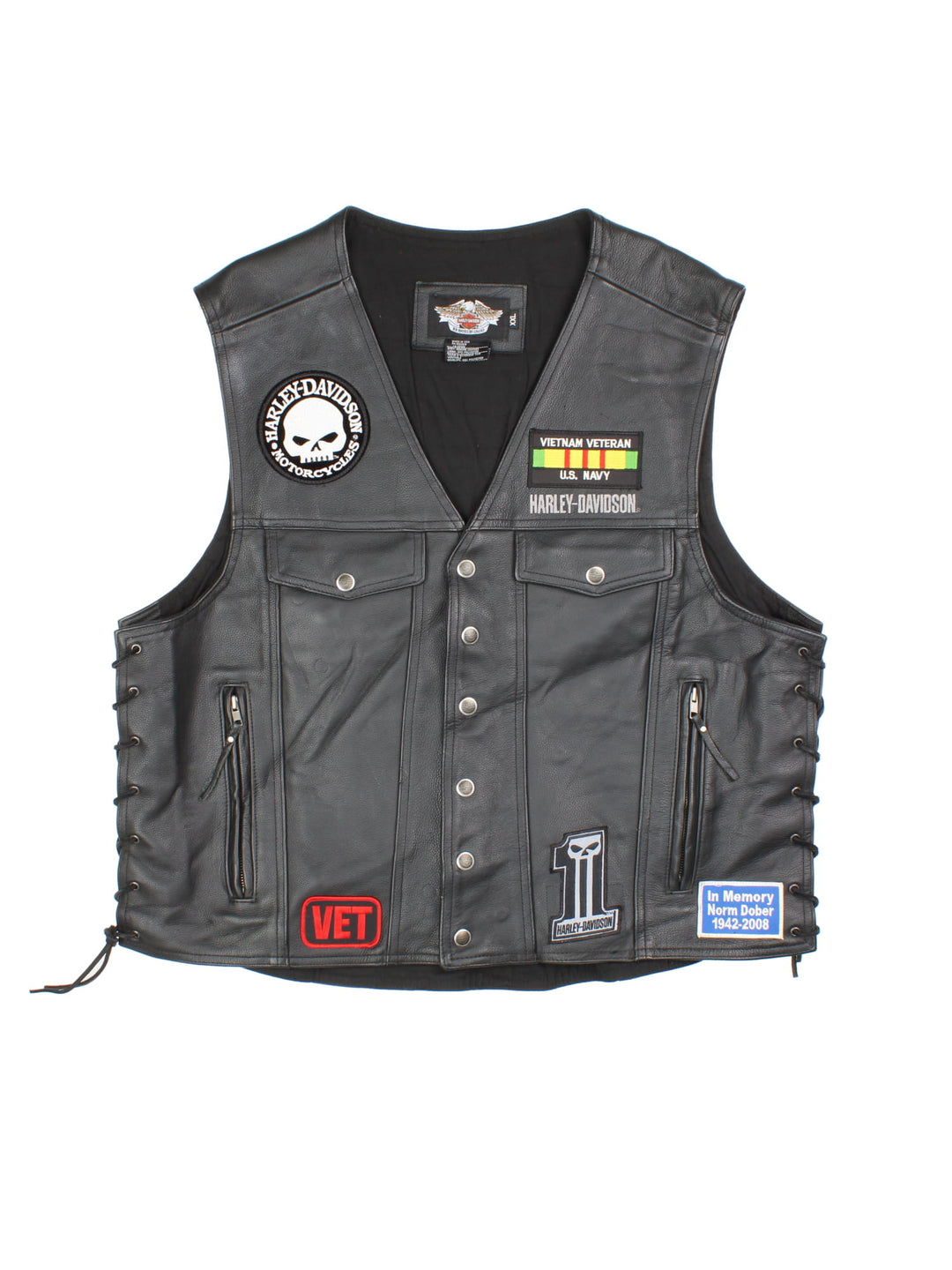 Vintage Harley-Davidson Leather Biker Vest in a black colourway. Buttons up and has multiple pockets, and has embroidered logos and badges on the front.