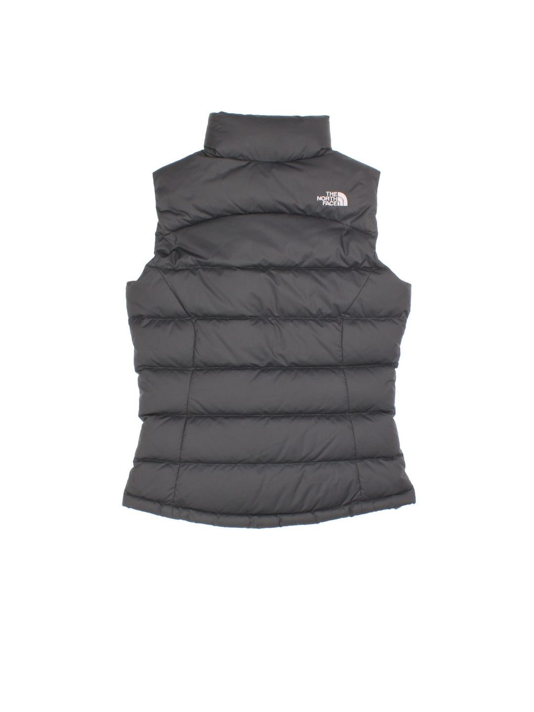 The North Face Down Puffer Gilet in a black colourway. Zips up and has side pockets, insulated lining, and has the logo embroidered on the front and back.