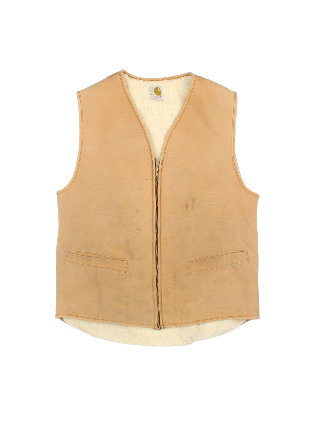 Vintage Carhartt Gilet in a tan colourway. Zips up and has side pockets and is insulated with a sherpa lining.