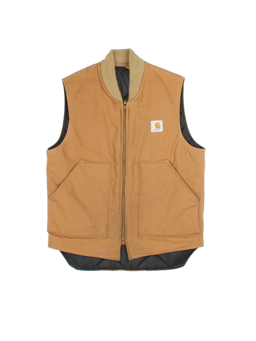 Vintage 80's Carhartt Gilet in a tan colourway. Zips up and has side pockets, insulated with a quilted lining, and has the logo embroidered on the front.