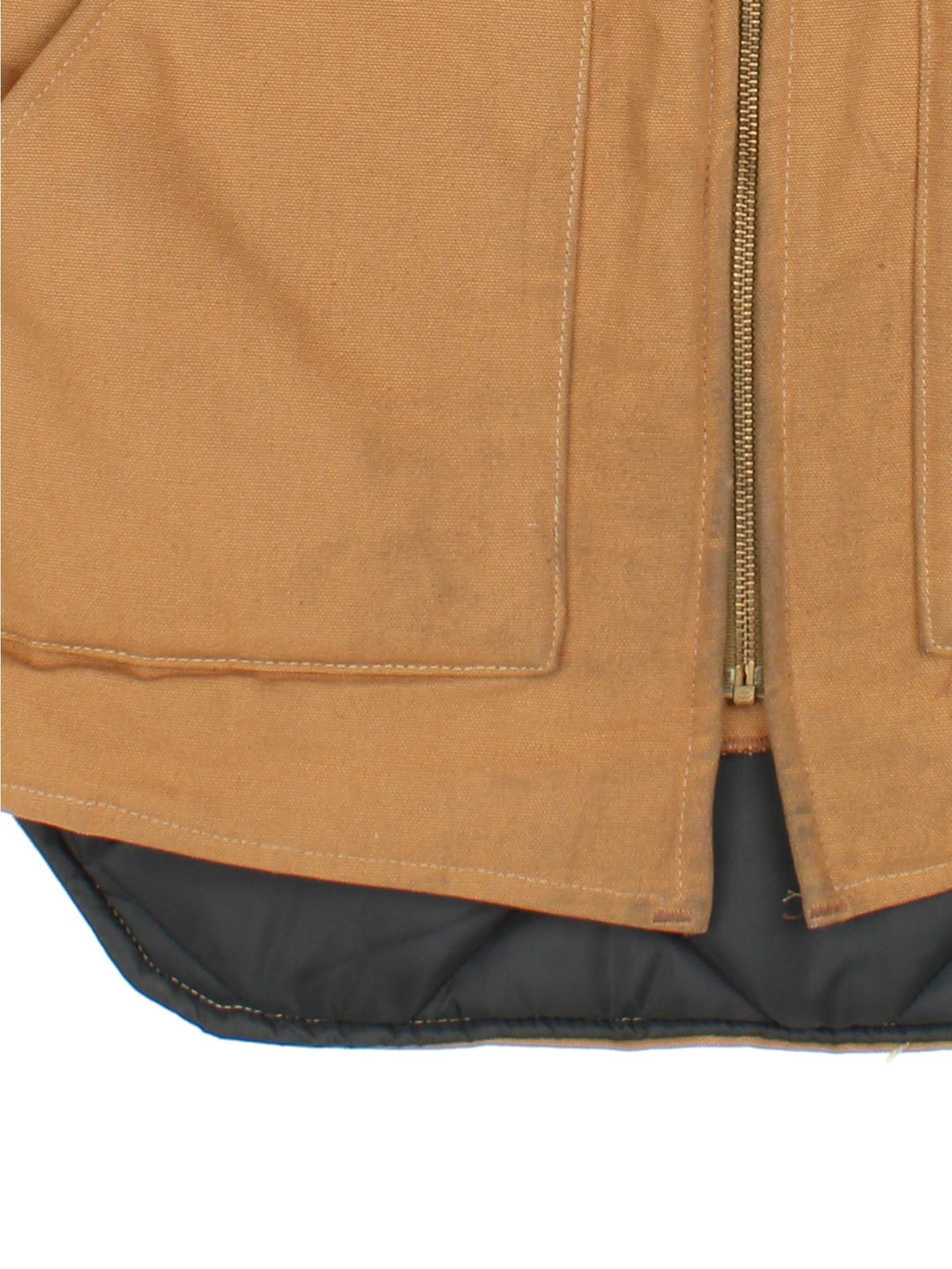 Vintage 80's Carhartt Gilet in a tan colourway. Zips up and has side pockets, insulated with a quilted lining, and has the logo embroidered on the front.