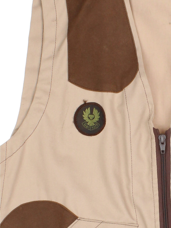 Vintage 90's Barbour Hunting Vest in a brown colourway. Zips up and has multiple pockets, and the logo and Porsche badge embroidered on the front.