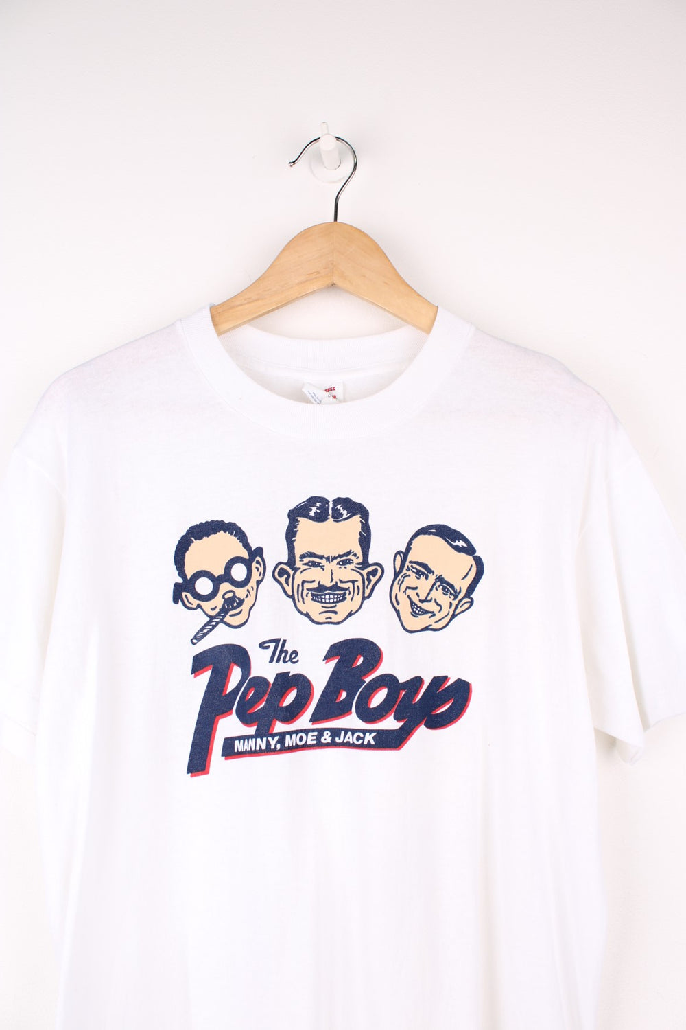 Made in the USA vintage late 1980's single stitch t-shirt. Features "The Pep Boys" printed graphic on the front. As seen on Artist Keith Haring