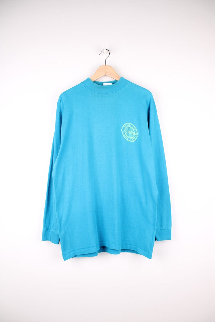 Vintage L.A. Gear Street Gym Longsleeve T-Shirt in a blue and green colourway with the logo puff printed on the front and back.  