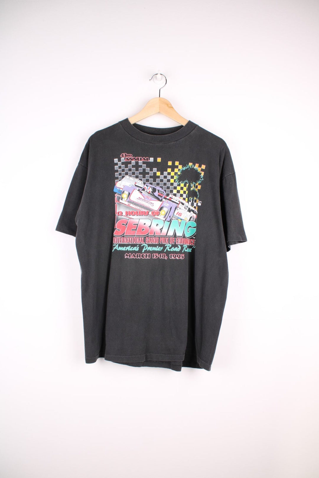 90's Vintage Nascar T-Shirt in a black colourway with the spell out and graphic printed on front.