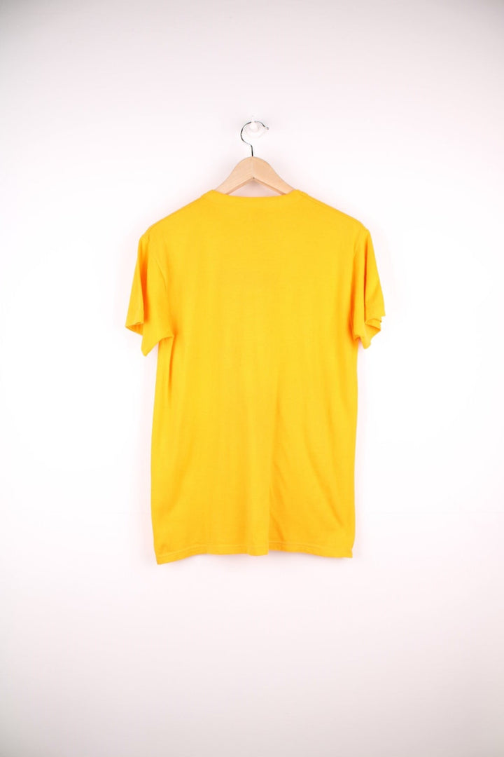 Vintage 1987 Baltimore to O.C. Cyclist T-Shirt in a yellow colourway with the spell out logo and cyclist graphic printed on the front. 