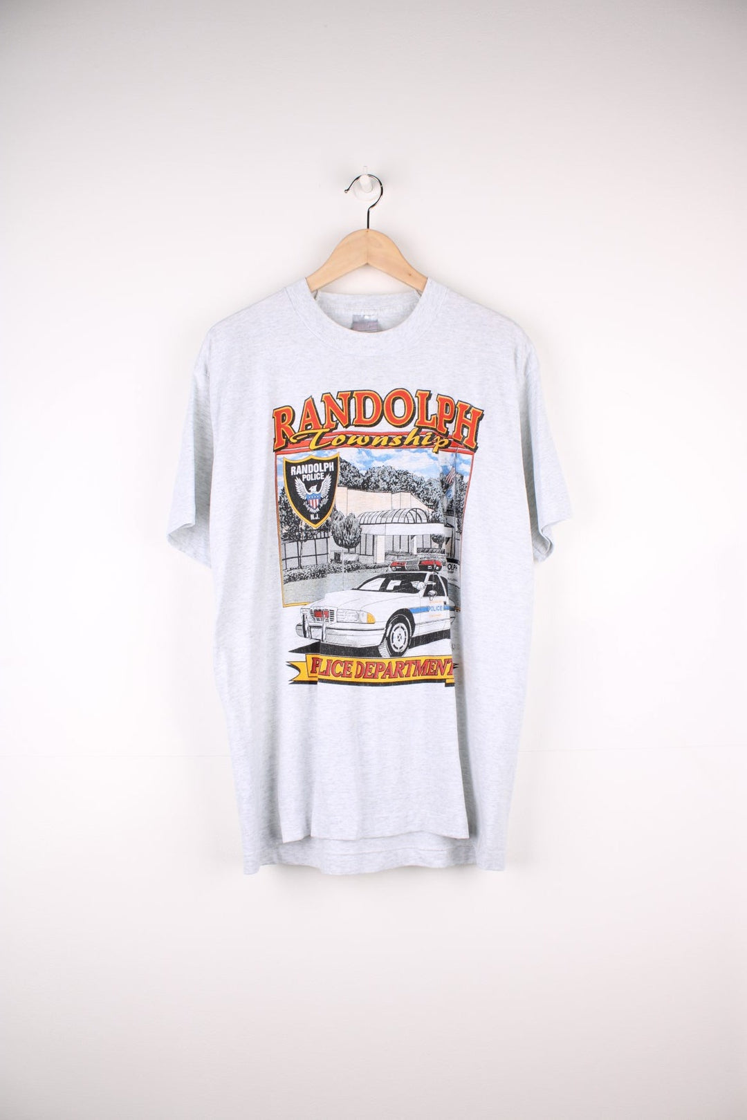 Vintage 1995 Randolph Township Police Department Graphic T-Shirt in a grey colourway with the police station and car graphic printed on the front.