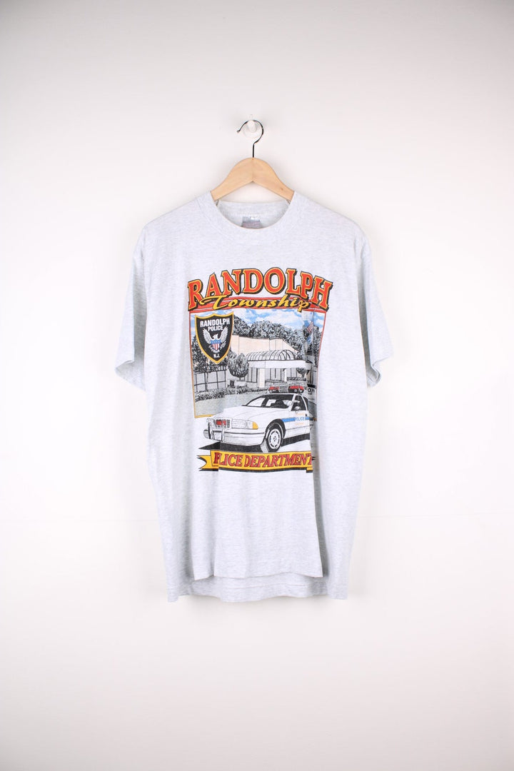 Vintage 1995 Randolph Township Police Department Graphic T-Shirt in a grey colourway with the police station and car graphic printed on the front.