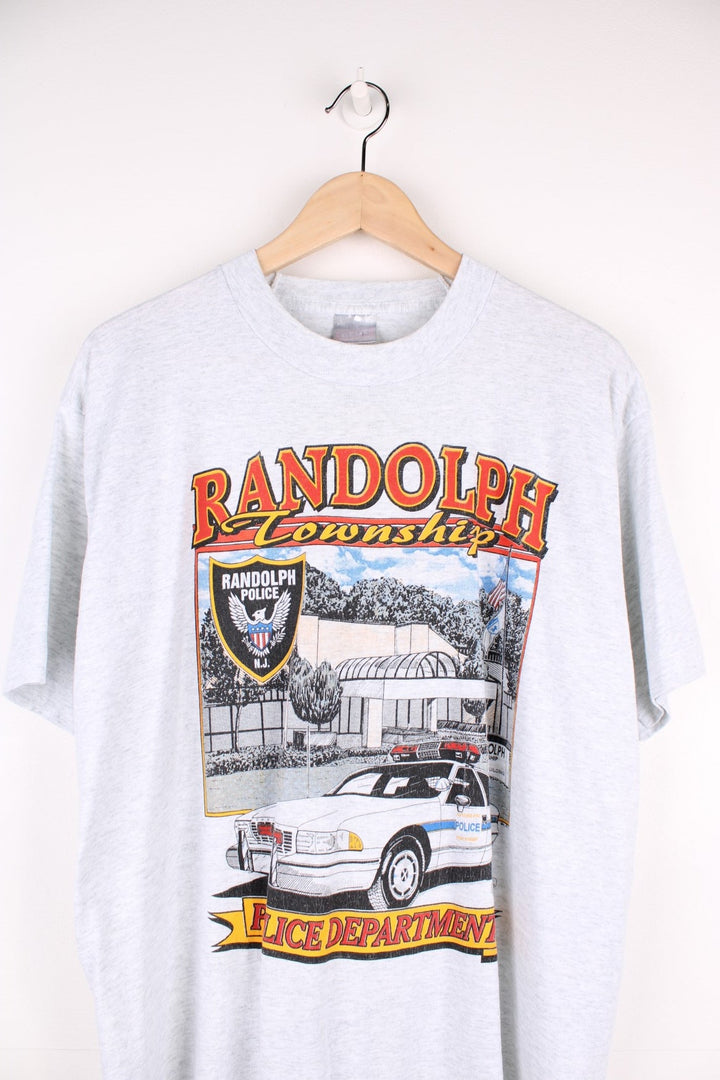 Vintage 1995 Randolph Township Police Department Graphic T-Shirt in a grey colourway with the police station and car graphic printed on the front.