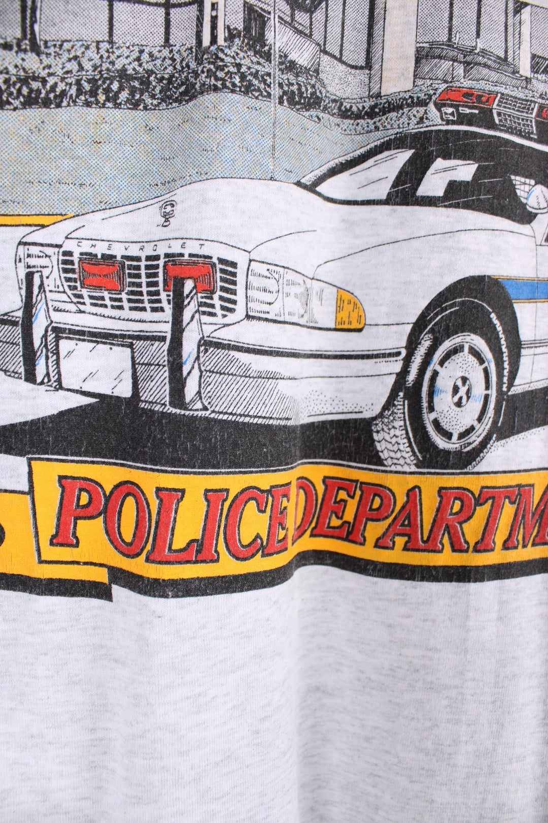 Vintage 1995 Randolph Township Police Department Graphic T-Shirt in a grey colourway with the police station and car graphic printed on the front.