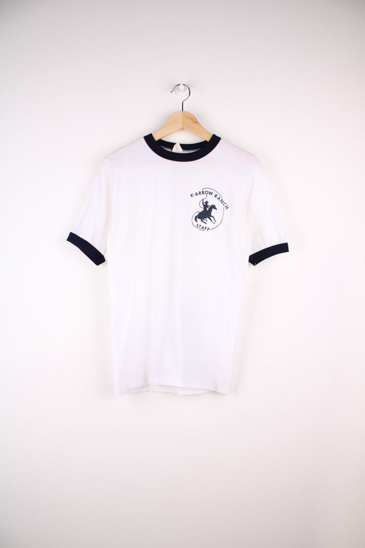 Vintage 80's Cowboy K-Arrow Ranch Ringer T-Shirt in a white colourway with navy blue cuffs, and has the logo printed on front.