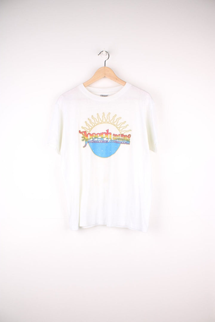 Vintage 90's Joseph and the Amazing Technicolor Dreamcoat T-Shirt in a white colourway with the multicoloured spell out logo printed on the front, single stitch t-shirt on a hanes tag.