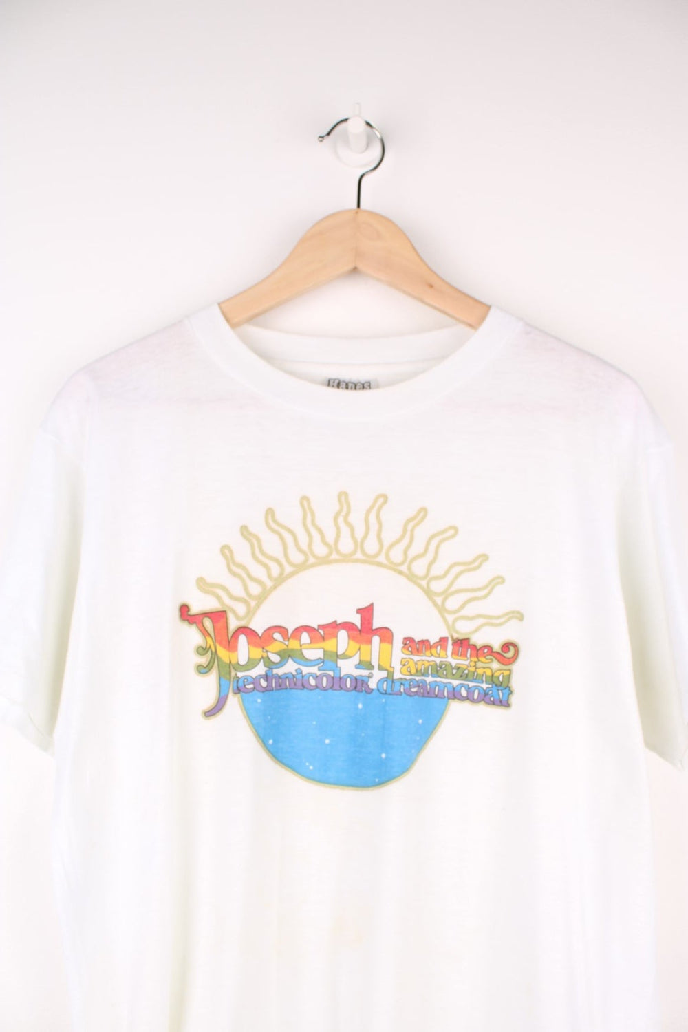 Vintage 90's Joseph and the Amazing Technicolor Dreamcoat T-Shirt in a white colourway with the multicoloured spell out logo printed on the front, single stitch t-shirt on a hanes tag.