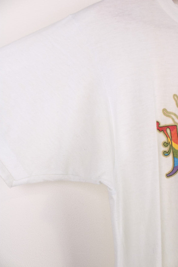 Vintage 90's Joseph and the Amazing Technicolor Dreamcoat T-Shirt in a white colourway with the multicoloured spell out logo printed on the front, single stitch t-shirt on a hanes tag.