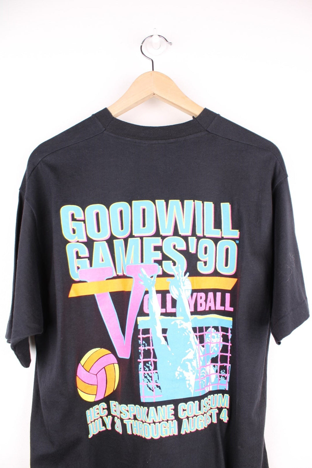 Vintage 90's Goodwill Games Volleyball Tournament T-Shirt in a black colourway with spell out printed on the front and on the back a big graphic.