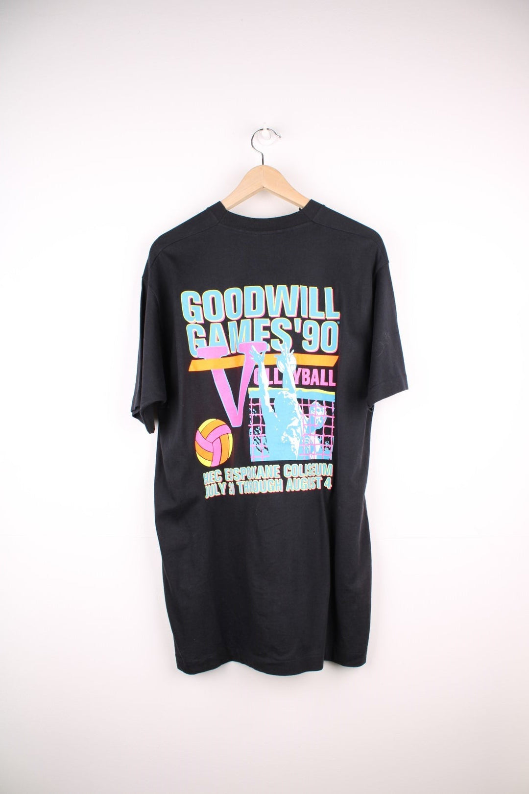 Vintage 90's Goodwill Games Volleyball Tournament T-Shirt in a black colourway with spell out printed on the front and on the back a big graphic.