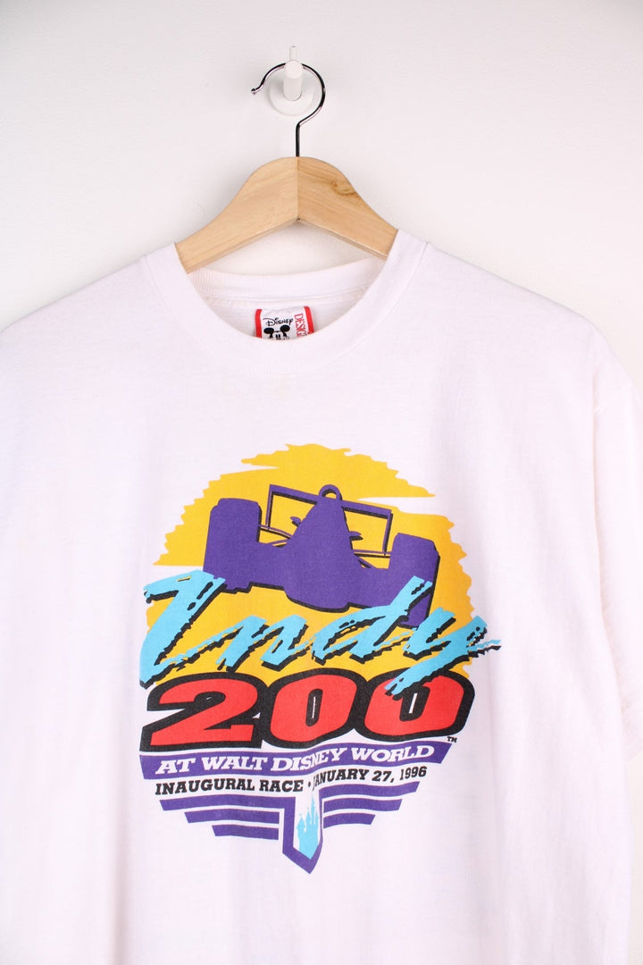 1996  World Race Graphic T-Shirt in a  colourway with the logo printed on the front and on the back a graphic of all the cars.