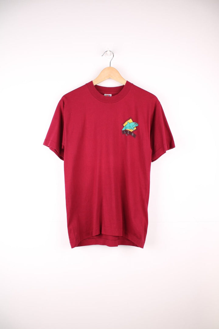 Vintage 90s LCM Dolphins single stitch T-Shirt in burgundy red with print on the chest and back.