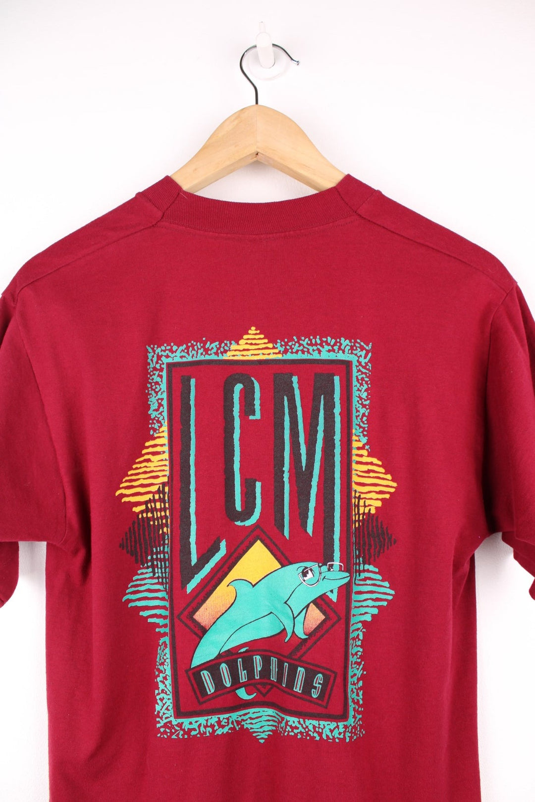 Vintage 90s LCM Dolphins single stitch T-Shirt in burgundy red with print on the chest and back.