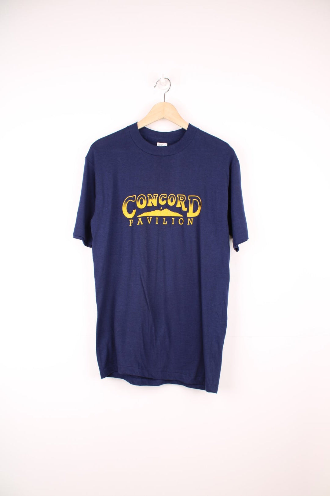 Vintage 1980s Concord Pavilion single stitch T-Shirt with printed yellow logo across the chest.