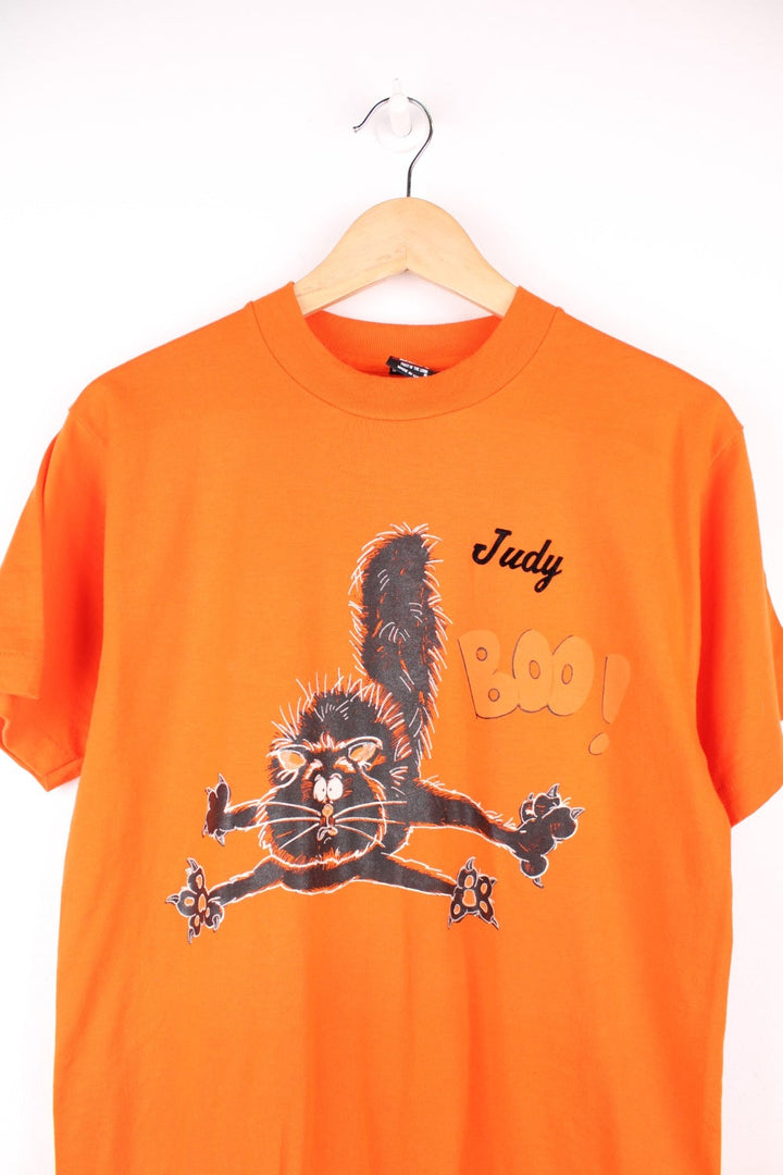 Vintage 90s single stitch graphic T-Shirt with print on the front and velvet lettering on the back.