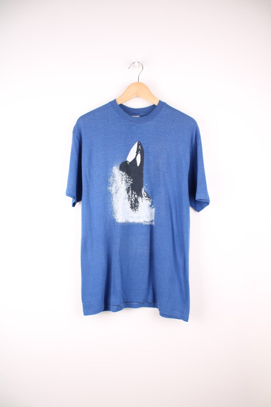 1980s SeaWorld orca graphic tee in blue. 