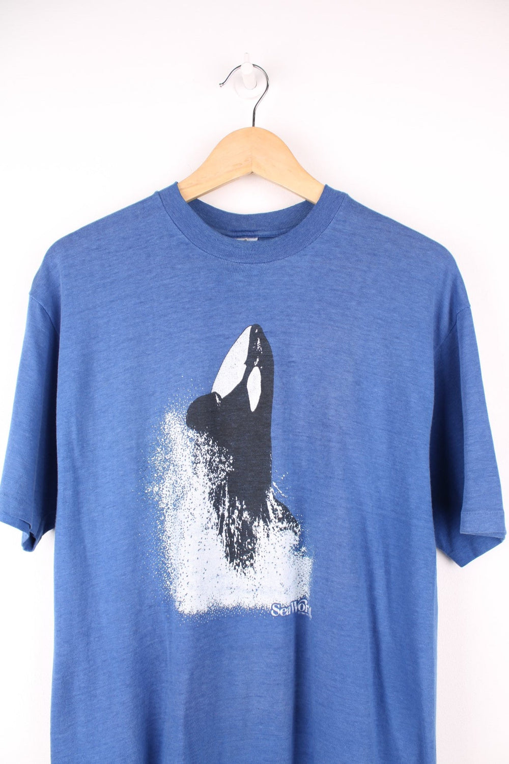 1980s SeaWorld orca graphic tee in blue. 