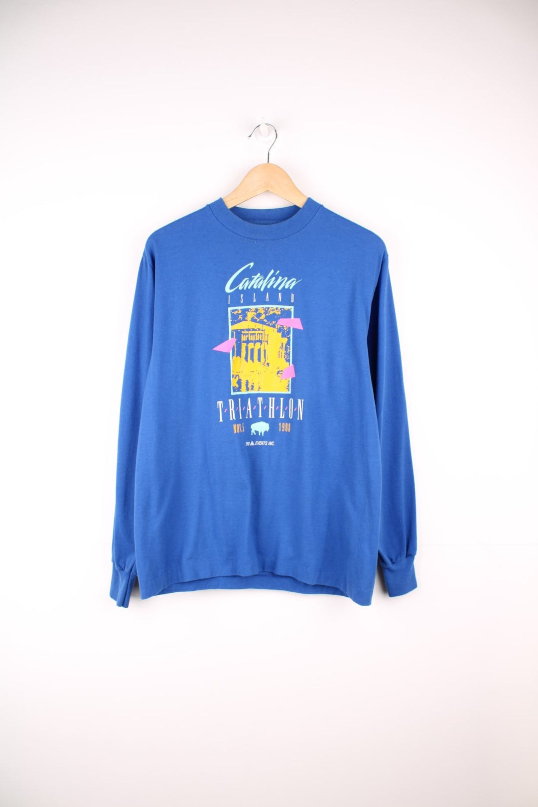 1988 Catalina Island Triathlon long-sleeved tee in blue with pink and yellow abstract designs. 