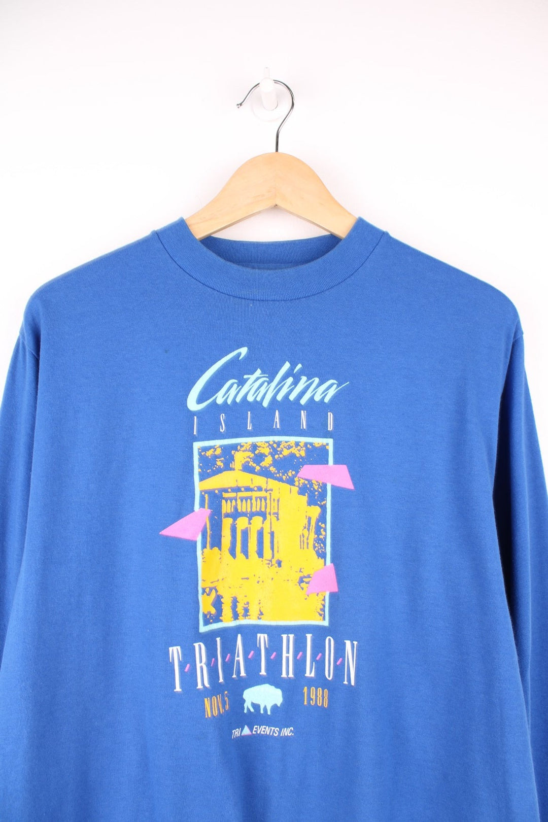 1988 Catalina Island Triathlon long-sleeved tee in blue with pink and yellow abstract designs. 