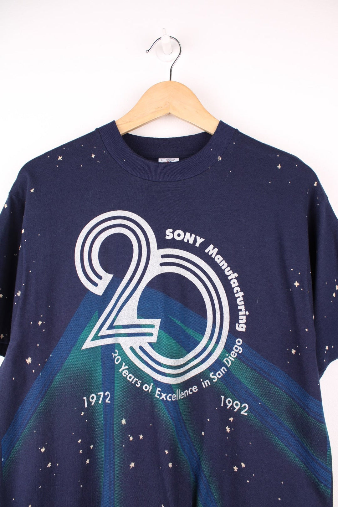 Sony Manufacturing '20 Years of Excellence in San Diego' spellout tee with scattered star pattern.