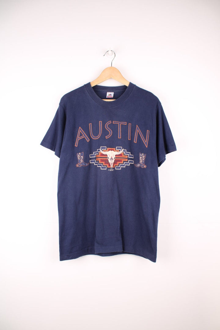 Navy blue Austin spellout tee with cow skull and cowboy boot design. 